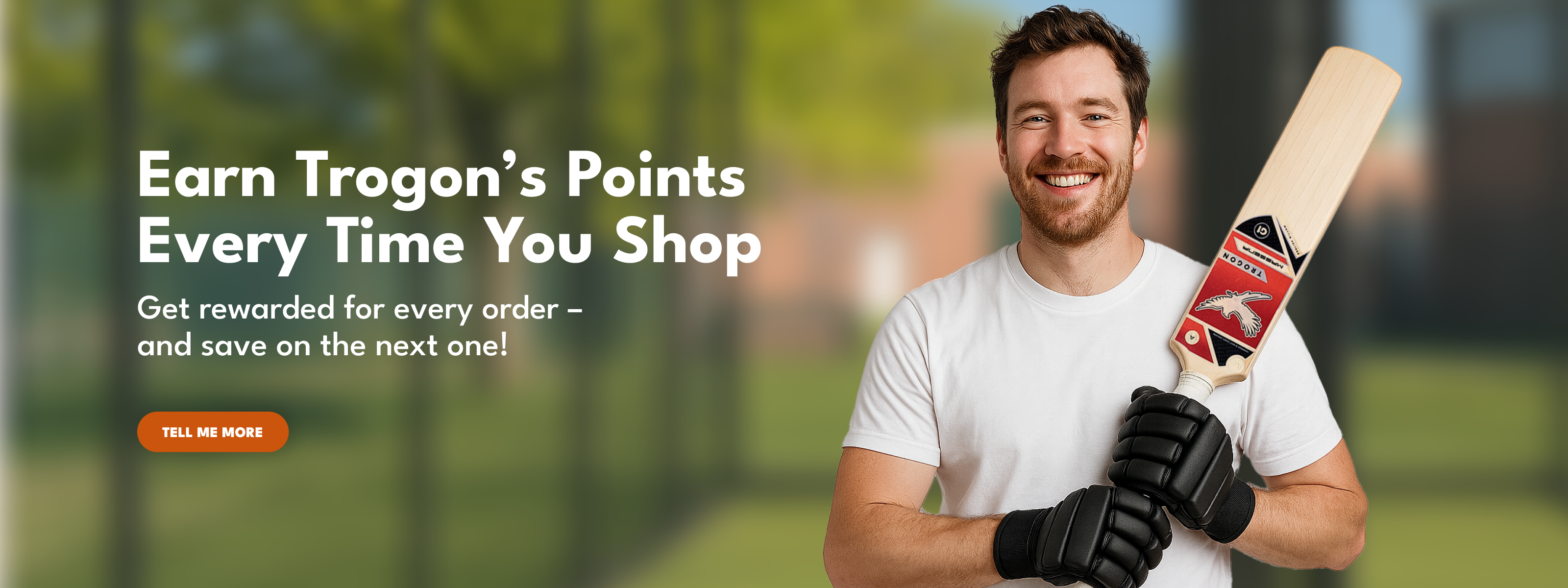 Man holding a cricket bat with promotional text for Trogon's Points on a blurred sports field background