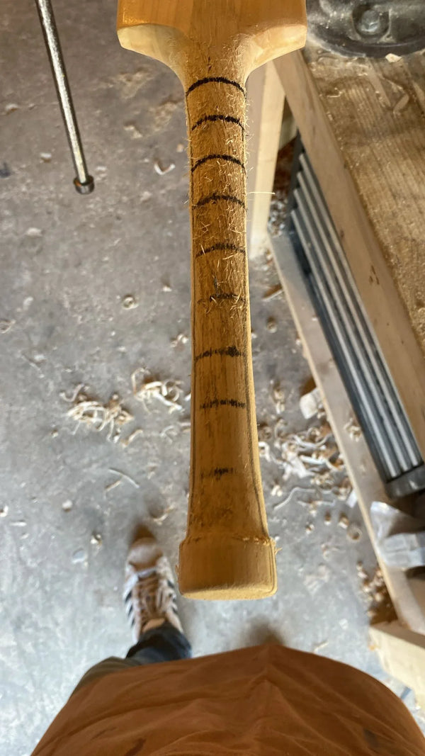 Resizing a cricket bat handle, making it thiner