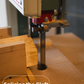 Woodworking machine cutting a piece of wood with 'Splicing the Cleft' text and TROGON logo.