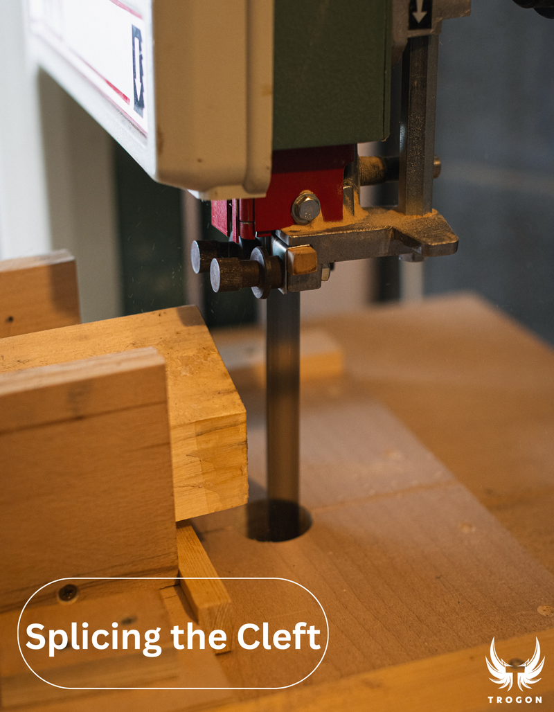 Woodworking machine cutting a piece of wood with 'Splicing the Cleft' text and TROGON logo.
