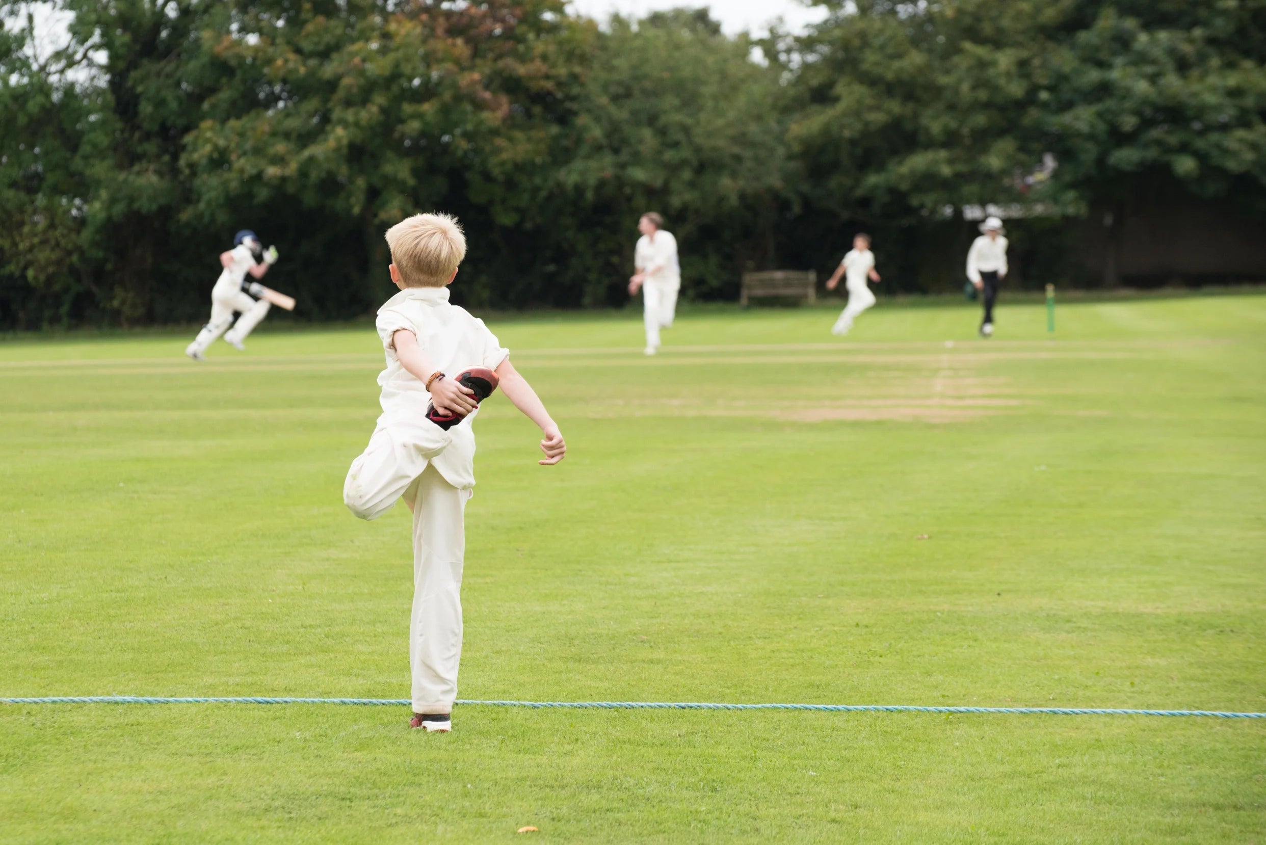 An image showing a a young cricketer getting ready get on the pitch to play cricket