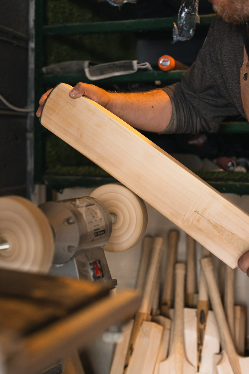 Polishing and waxing a hand made cricket bat